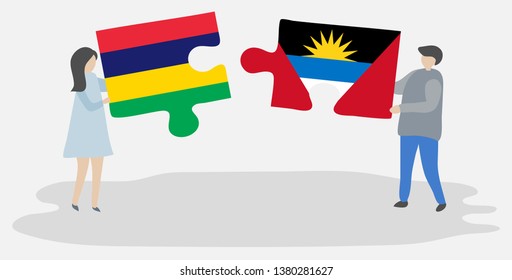 Couple holding two puzzles pieces with Mauritian and Antiguan flags. Mauritius and Antigua and Barbuda national symbols together.