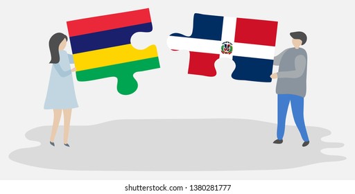 Couple holding two puzzles pieces with Mauritian and Dominican flags. Mauritius and Dominican Republic national symbols together.
