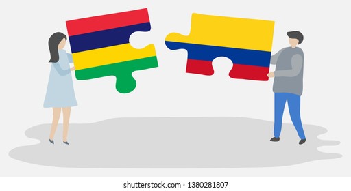 Couple holding two puzzles pieces with Mauritian and Colombian flags. Mauritius and Colombia national symbols together.