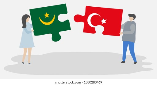 Couple holding two puzzles pieces with Mauritanian and Turkish flags. Mauritania and Turkey national symbols together.