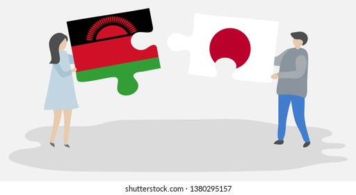 Couple holding two puzzles pieces with Malawian and Japanese flags. Malawi and Japan national symbols together.