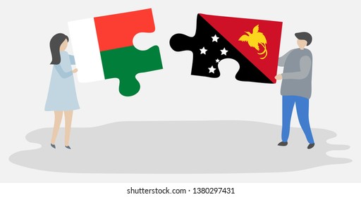 Couple holding two puzzles pieces with Malagasy and Papuan flags. Madagascar and Papua New Guinea national symbols together.