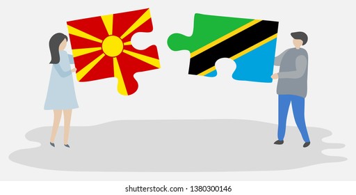 Couple holding two puzzles pieces with Macedonian and Tanzanian flags. Macedonia and Tanzania national symbols together.