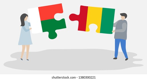 Couple holding two puzzles pieces with Malagasy and Guinean flags. Madagascar and Guinea national symbols together.