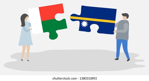 Couple holding two puzzles pieces with Malagasy and Nauruan flags. Madagascar and Nauru national symbols together.