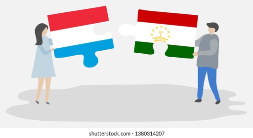 Couple holding two puzzles pieces with Luxembourgish and Tajikistani flags. Luxembourg and Tajikistan national symbols together.