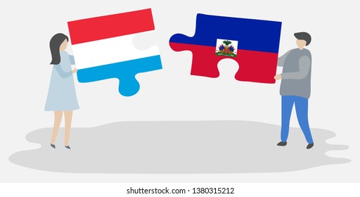 Couple holding two puzzles pieces with Luxembourgish and Haitian flags. Luxembourg and Haiti national symbols together.