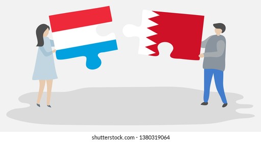 Couple holding two puzzles pieces with Luxembourgish and Bahraini flags. Luxembourg and Bahrain national symbols together.