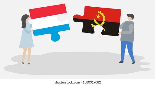 Couple holding two puzzles pieces with Luxembourgish and Angolan flags. Luxembourg and Angola national symbols together.