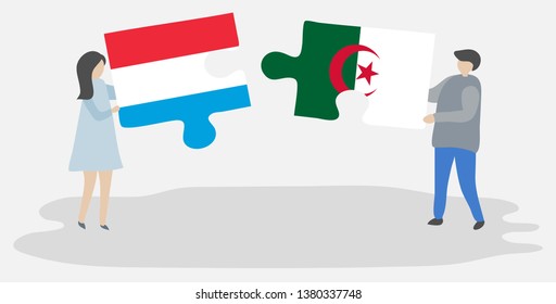 Couple holding two puzzles pieces with Luxembourgish and Algerian flags. Luxembourg and Algeria national symbols together.