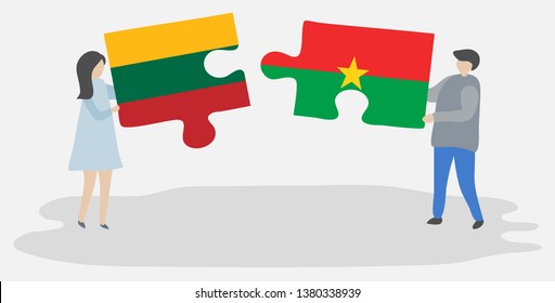Couple holding two puzzles pieces with Lithuanian and Burkinabe flags. Lithuania and Burkina Faso national symbols together.