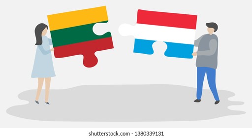 Couple holding two puzzles pieces with Lithuanian and Luxembourgish flags. Lithuania and Luxembourg national symbols together.