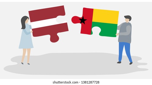 Couple holding two puzzles pieces with Latvian and Bissau-Guinean flags. Latvia and Guinea-Bissau national symbols together.