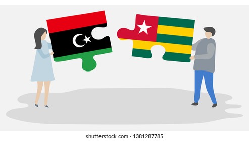 Couple holding two puzzles pieces with Libyan and Togolese flags. Libya and Togo national symbols together.