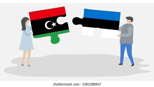 Couple holding two puzzles pieces with Libyan and Estonian flags. Libya and Estonia national symbols together.