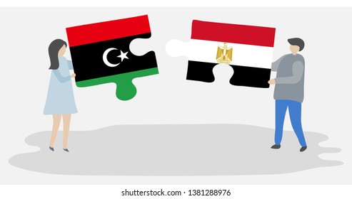 Couple holding two puzzles pieces with Libyan and Egyptian flags. Libya and Egypt national symbols together.