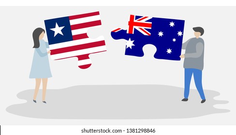 Couple holding two puzzles pieces with Liberian and Australian flags. Liberia and Australia national symbols together.