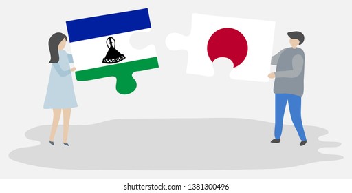 Couple holding two puzzles pieces with Basotho and Japanese flags. Lesotho and Japan national symbols together.