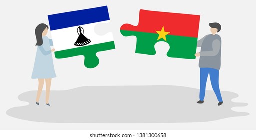 Couple holding two puzzles pieces with Basotho and Burkinabe flags. Lesotho and Burkina Faso national symbols together.