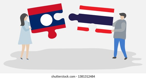 Couple holding two puzzles pieces with Lao and Thai flags. Laos and Thailand national symbols together.