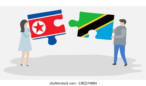 Couple holding two puzzles pieces with North Korean and Tanzanian flags. North Korea and Tanzania national symbols together.