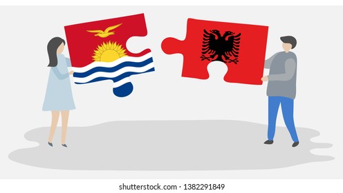 Couple holding two puzzles pieces with I-Kiribati and Albanian flags. Kiribati and Albania national symbols together.