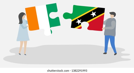 Couple holding two puzzles pieces with Ivorian and Kittitian flags. Ivory Coast and Saint Kitts and Nevis national symbols together.