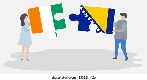 Couple holding two puzzles pieces with Ivorian and Bosnian flags. Ivory Coast and Bosnia and Herzegovina national symbols together.