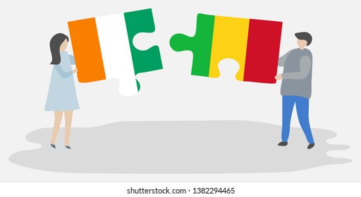 Couple holding two puzzles pieces with Ivorian and Malian flags. Ivory Coast and Mali national symbols together.