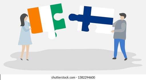 Couple holding two puzzles pieces with Ivorian and Finnish flags. Ivory Coast and Finland national symbols together.