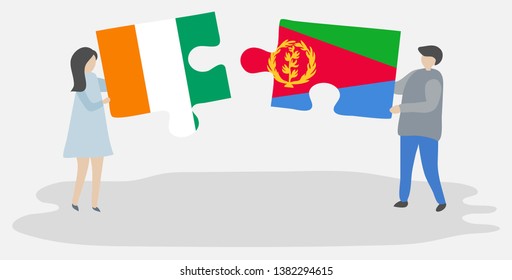 Couple holding two puzzles pieces with Ivorian and Eritrean flags. Ivory Coast and Eritrea national symbols together.