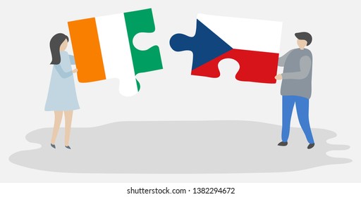Couple holding two puzzles pieces with Ivorian and Czech flags. Ivory Coast and Czech Republic national symbols together.