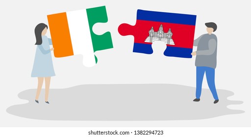 Couple holding two puzzles pieces with Ivorian and Cambodian flags. Ivory Coast and Cambodia national symbols together.