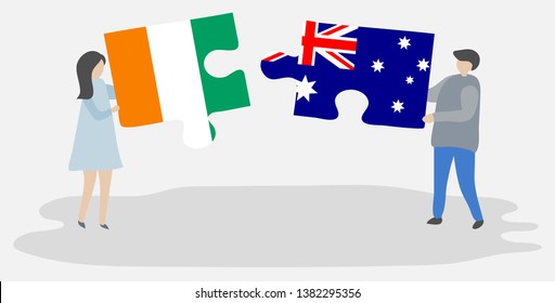 Couple holding two puzzles pieces with Ivorian and Australian flags. Ivory Coast and Australia national symbols together.