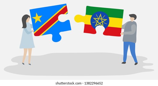 Couple holding two puzzles pieces with Congolese and Ethiopian flags. Democratic Republic of the Congo and Ethiopia national symbols together.