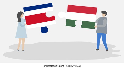 Couple holding two puzzles pieces with Costa Rican and Hungarian flags. Costa Rica and Hungary national symbols together.