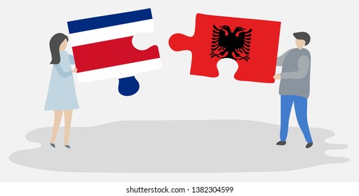 Couple holding two puzzles pieces with Costa Rican and Albanian flags. Costa Rica and Albania national symbols together.