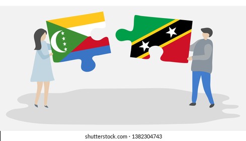 Couple holding two puzzles pieces with Comoran and Kittitian flags. Comoros and Saint Kitts and Nevis national symbols together.