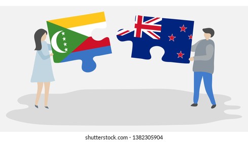 Couple holding two puzzles pieces with Comoran and NZ flags. Comoros and New Zealand national symbols together.