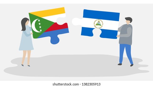 Couple holding two puzzles pieces with Comoran and Nicaraguan flags. Comoros and Nicaragua national symbols together.