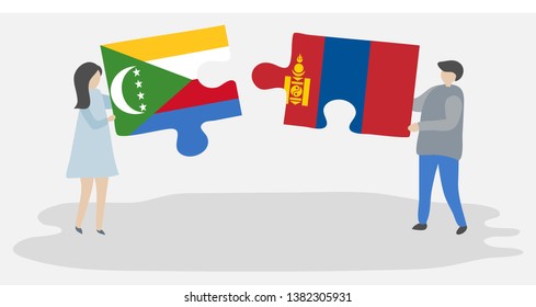 Couple holding two puzzles pieces with Comoran and Mongolian flags. Comoros and Mongolia national symbols together.