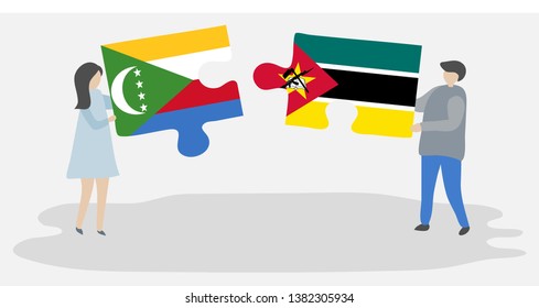 Couple holding two puzzles pieces with Comoran and Mozambican flags. Comoros and Mozambique national symbols together.