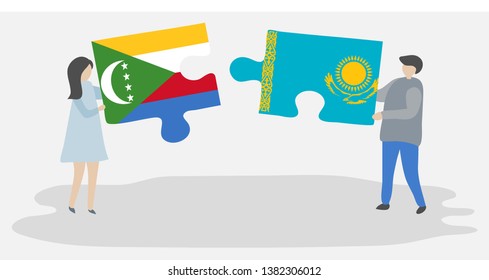 Couple holding two puzzles pieces with Comoran and Kazakh flags. Comoros and Kazakhstan national symbols together.