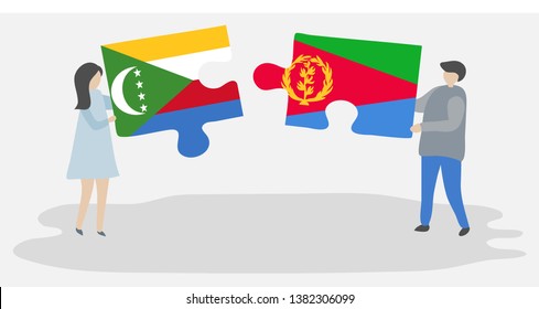 Couple holding two puzzles pieces with Comoran and Eritrean flags. Comoros and Eritrea national symbols together.