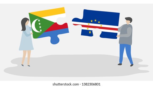 Couple holding two puzzles pieces with Comoran and Cabo Verdean flags. Comoros and Cape Verde national symbols together.