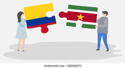 Couple holding two puzzles pieces with Colombian and Surinamese flags. Colombia and Suriname national symbols together.