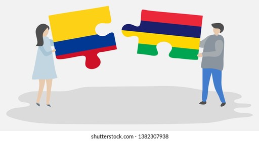 Couple holding two puzzles pieces with Colombian and Mauritian flags. Colombia and Mauritius national symbols together.