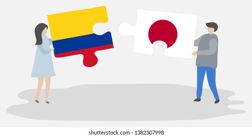 Couple holding two puzzles pieces with Colombian and Japanese flags. Colombia and Japan national symbols together.
