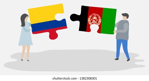 Couple holding two puzzles pieces with Colombian and Afghan flags. Colombia and Afghanistan national symbols together.