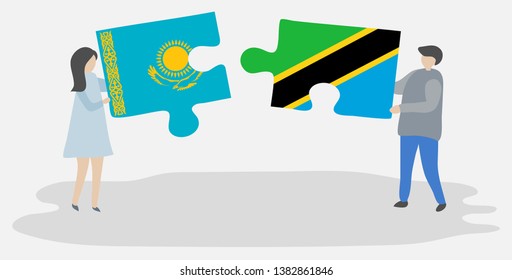 Couple holding two puzzles pieces with Kazakh and Tanzanian flags. Kazakhstan and Tanzania national symbols together.
